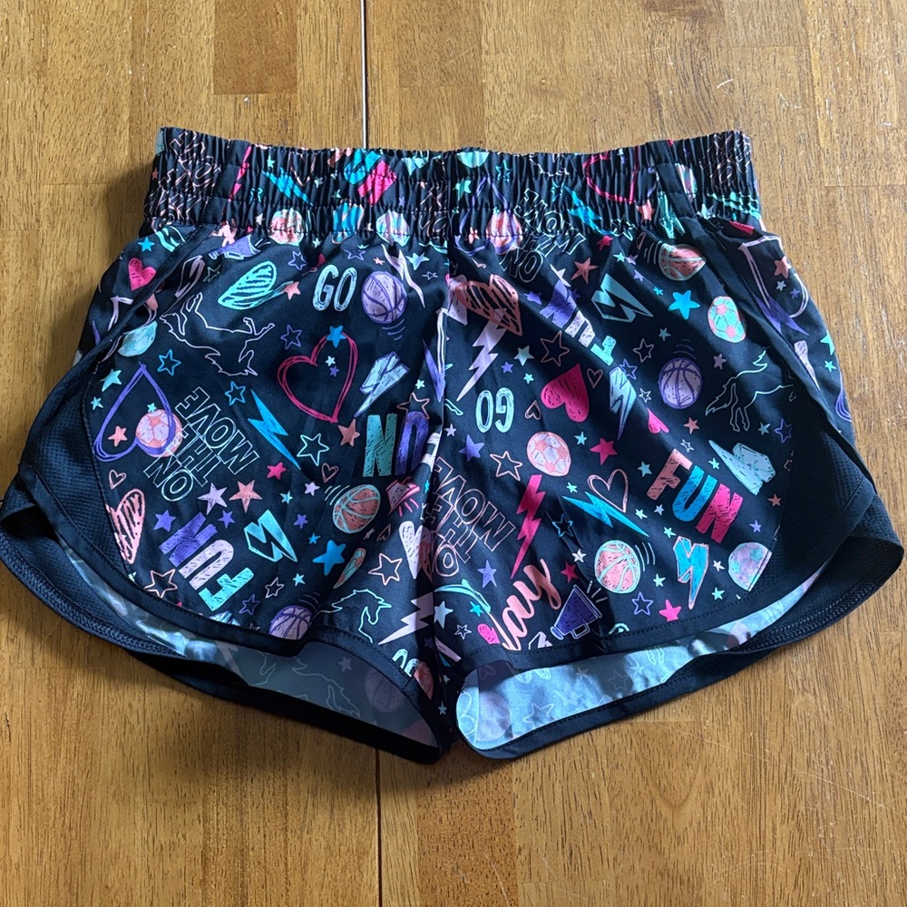 Athletic works large 10-12 running shorts with attached briefs black doodles